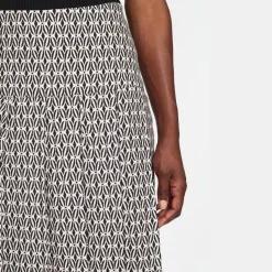 CEFINN Pleated Maxi Skirt in Ecru/Black