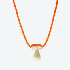 LA MOME BIJOU T Initial Joy Letter Necklace in Gold